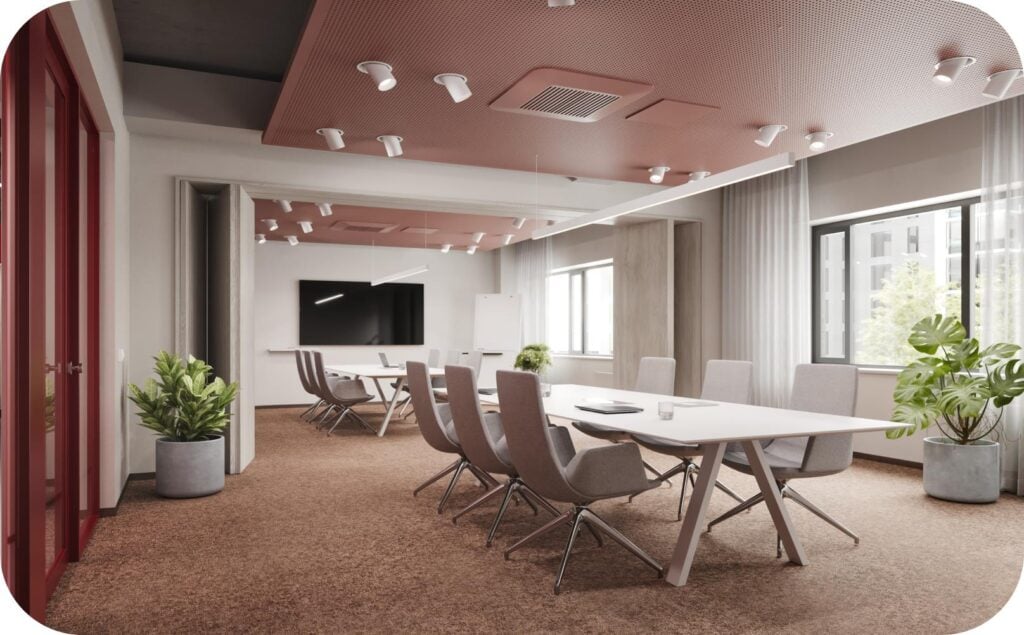 Modern conference room with gray chairs and table.