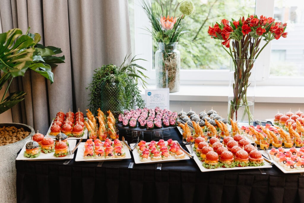 Elegant buffet with assorted appetizers and flowers