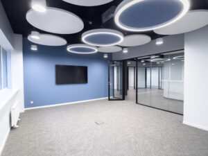 Modern office space with circular ceiling lights